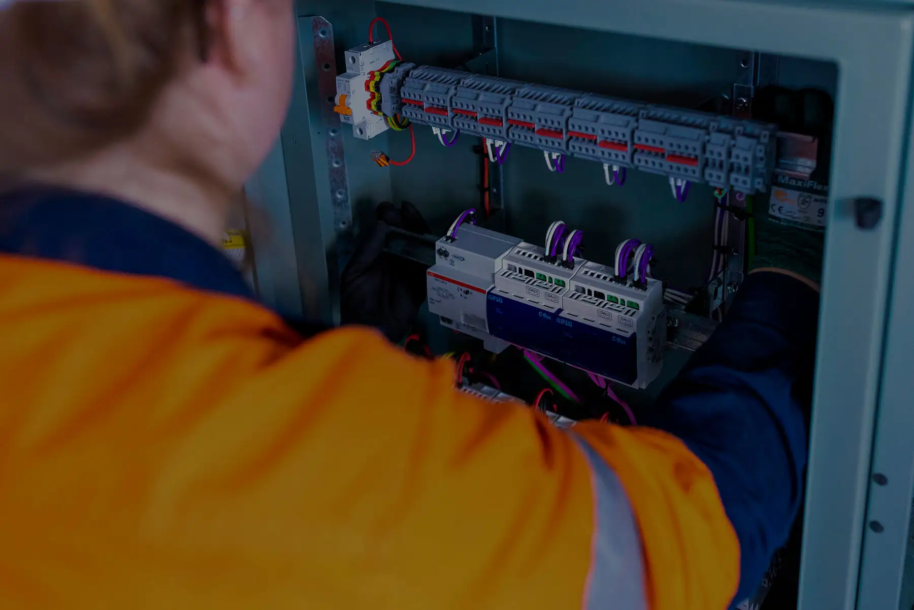 CINC Switchboards female electrician installing custom switchboard design